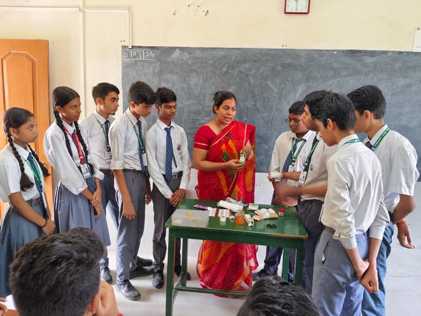 Teacher explaining at the board